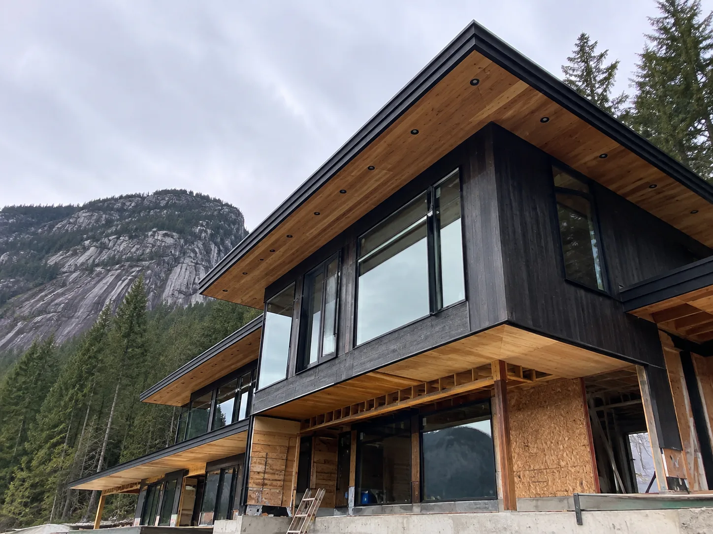 Modern West Coast home exterior with cedar soffit built with Chief Electrical Ltd. as electrical contractor